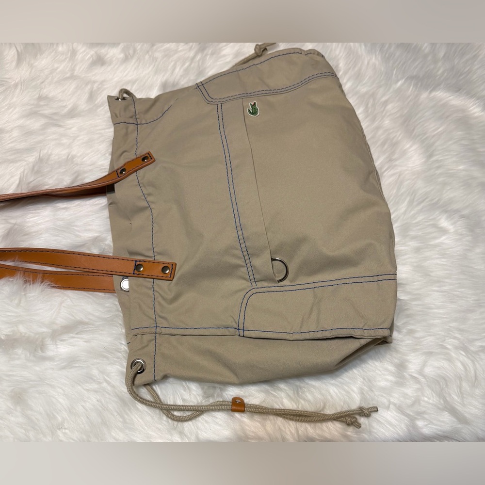 Lacoste Beige Canvas Sportsman Drawstring Tote with Tan Leather Handles - Picture 2 of 14